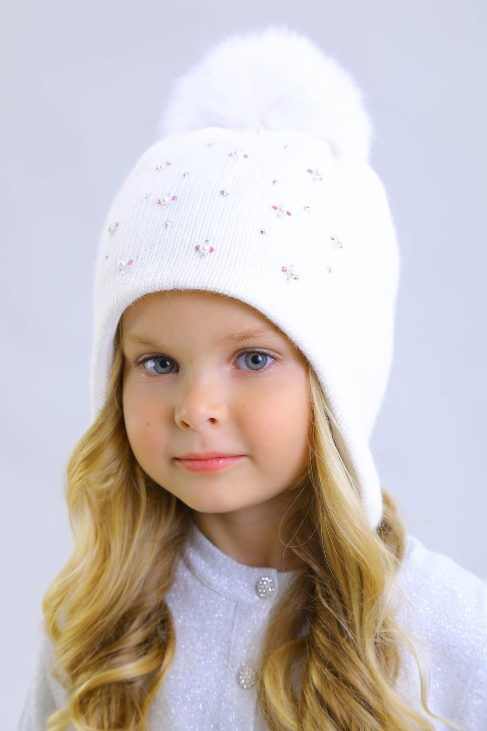 картинка Шапка DnD 43263L-11-52 (молочный) от магазина Маленькая Леди