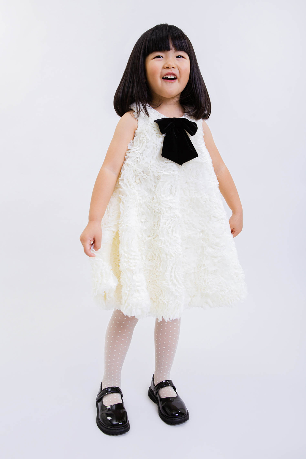 картинка Платье нарядное 2978-126-ВПШ (сливочный отд черный) от магазина Маленькая Леди